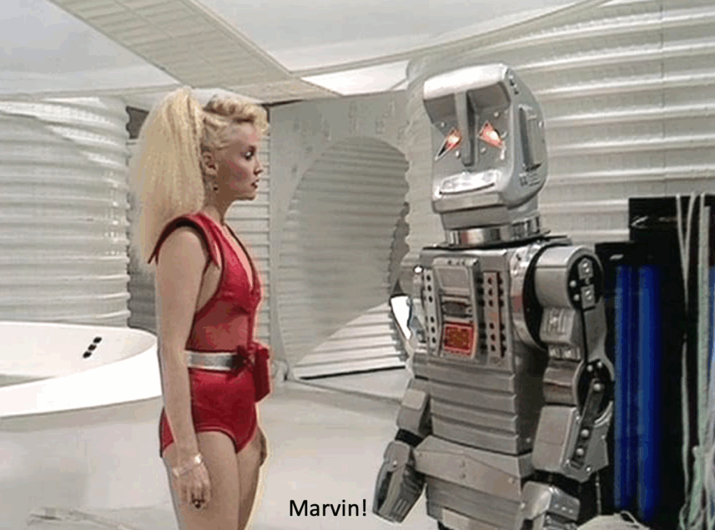 “MechaMarvin” in the making: Through a process known as Reinforcement Learning through Human Feedback, LLMs are trained to seek “truth” by following their programmers’ preferences, including their political and ideological beliefs; the results can be bizarre, akin to Marvin, the paranoid android left in charge of global optimism in The Hitchhiker’s Guide to the Galaxy. Shown, Sandra Dickinson and Marvin in the 1981 movie version. 