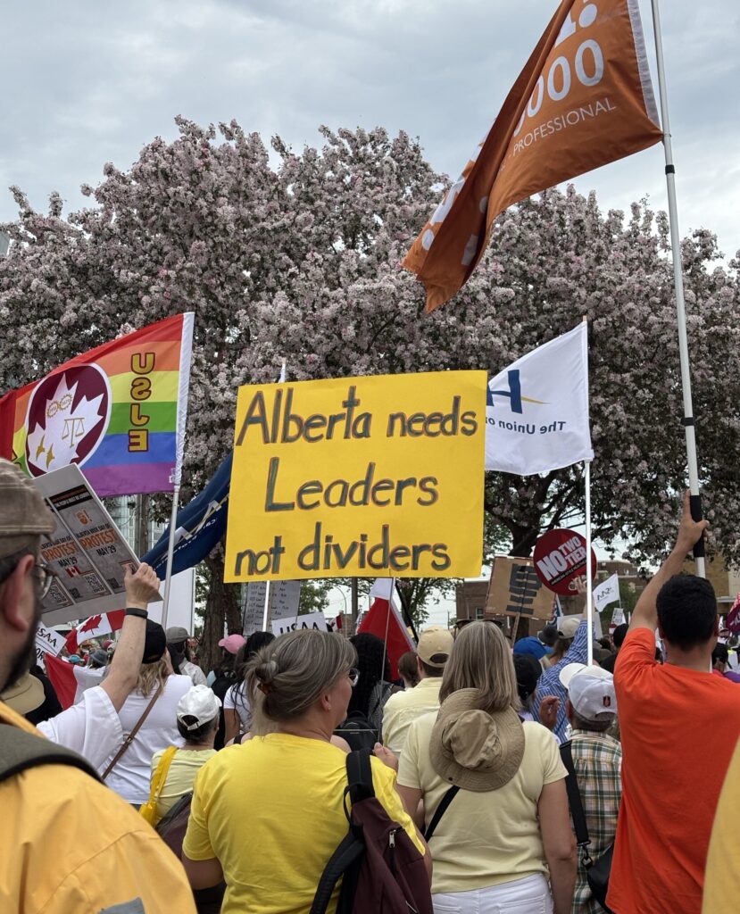 Rigged game: The 79 percent of Canadians who oppose Alberta’s separation would likely applaud the federal Clarity Act’s many built-in obstructions against secession – yet the very strength of that bias, the authors argue, could backfire by inflaming separatist passions. Shown, Alberta Federation of Labour anti-UCP protest, Edmonton, May 2026. 
