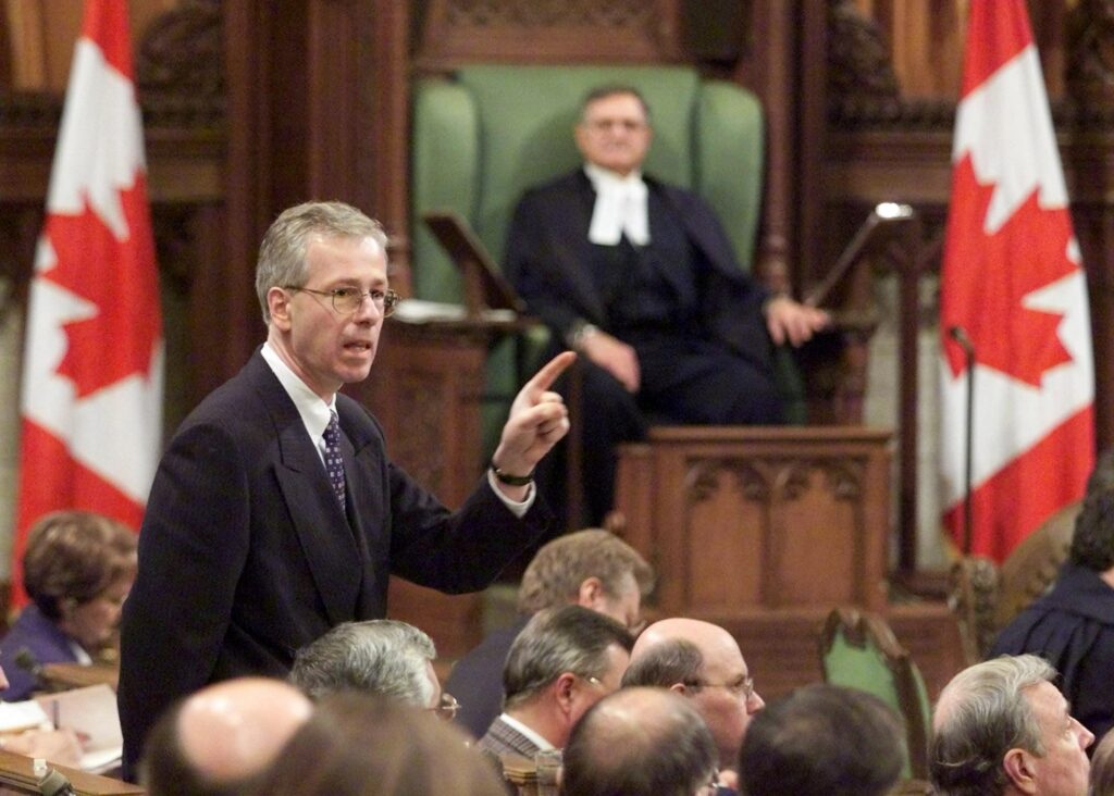 Out of sight, out of mind? Introduced by Intergovernmental Affairs Minister Stéphane Dion (shown, standing) in late 1999, the Clarity Act not only left key concepts undefined, placing future decision-making in Ottawa’s hands, but refused to spell out how secession negotiations could commence even after its conditions were met.