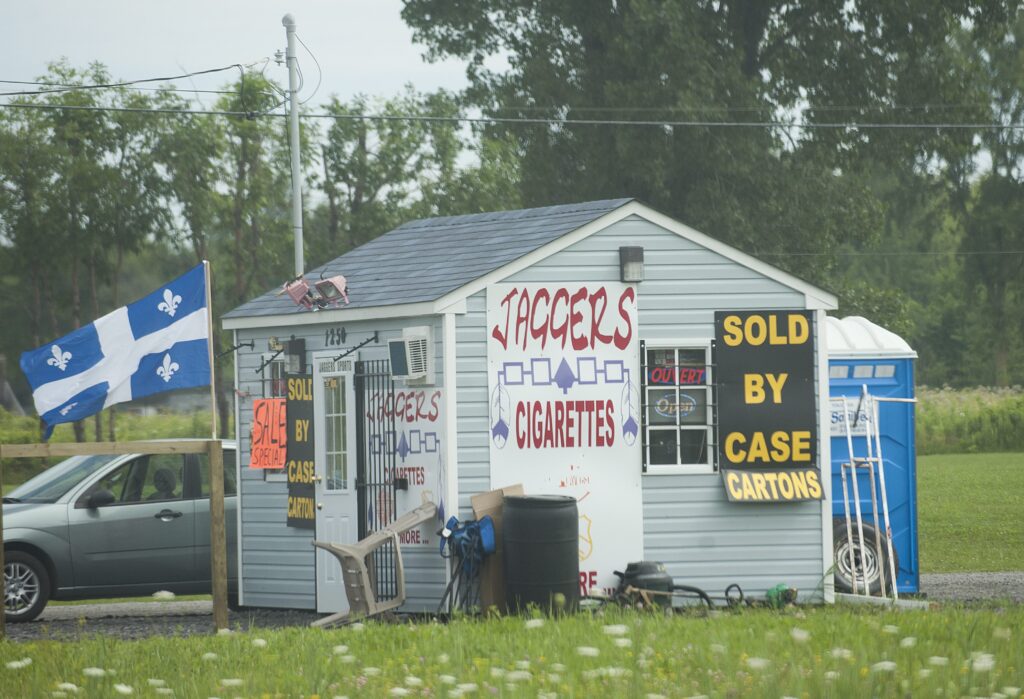 Clamping down on the legal sale of cigarettes and their alternatives can only benefit the black market, which is predominantly based on native reserves. Shown, a smoke shack at the Kahnawake Mohawk reserve near Montreal, Quebec.
