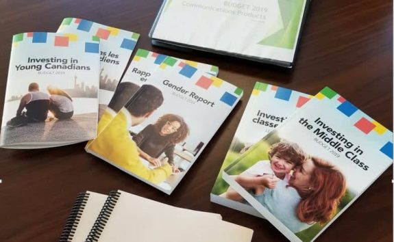 Trudeau Liberals 2019 budget booklets, attempting to deal with a national debt and deficit that has ballooned as a result of the pandemic.