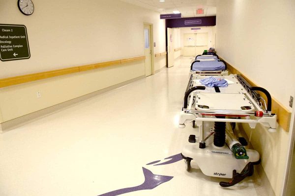 Picture of empty hospital hallway as governments attempted to prevent healthcare systems from being overrun by pandemic patients.