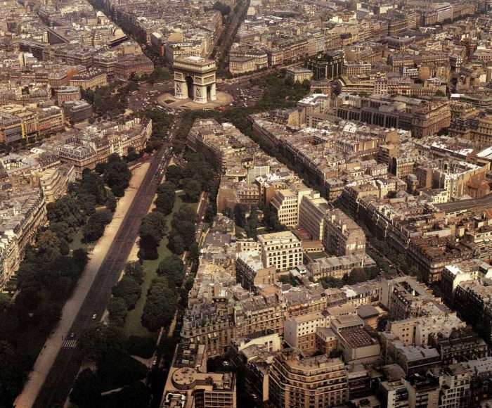 Aerial shot of Paris streets showing the mix of architectural styles in the modern world.