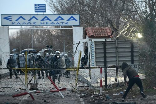 Border brinkmanship: Turkey’s President Recep Tayyip Erdogan (above) recently announced migrants in his country could leave for Europe, prompting violence at Turkish/Greek border crossings (below).